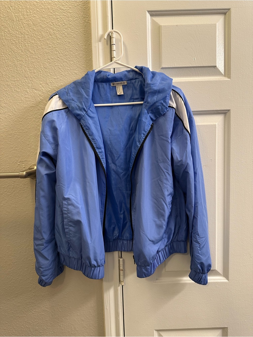Forever 21 Light Blue Hooded Windbreaker Jacket with White Accents. Size M